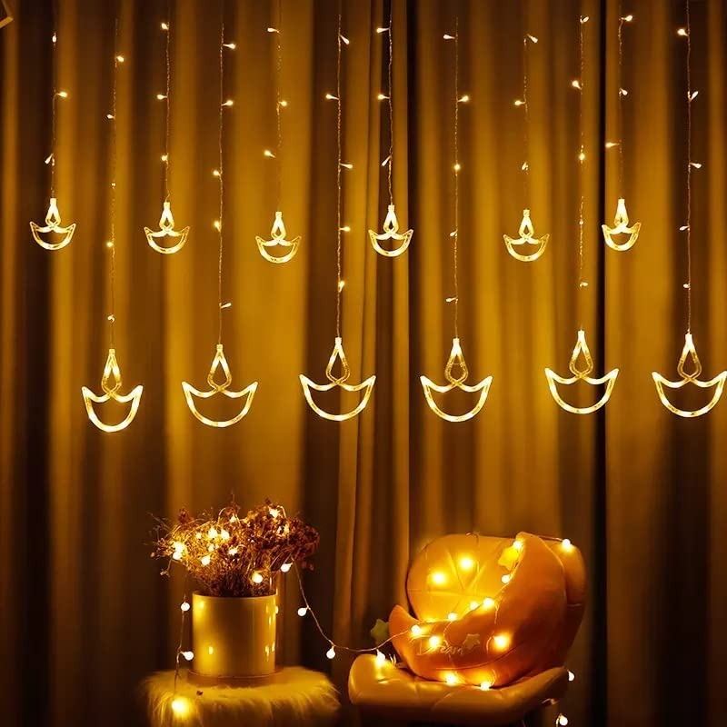 Warm White Diya/Diwali Light Curtain, Led String Copper Lights with Pack of 12 Hanging Diyas, 8 Flashing Modes, Decoration, Prong Base, 2.5 Meters